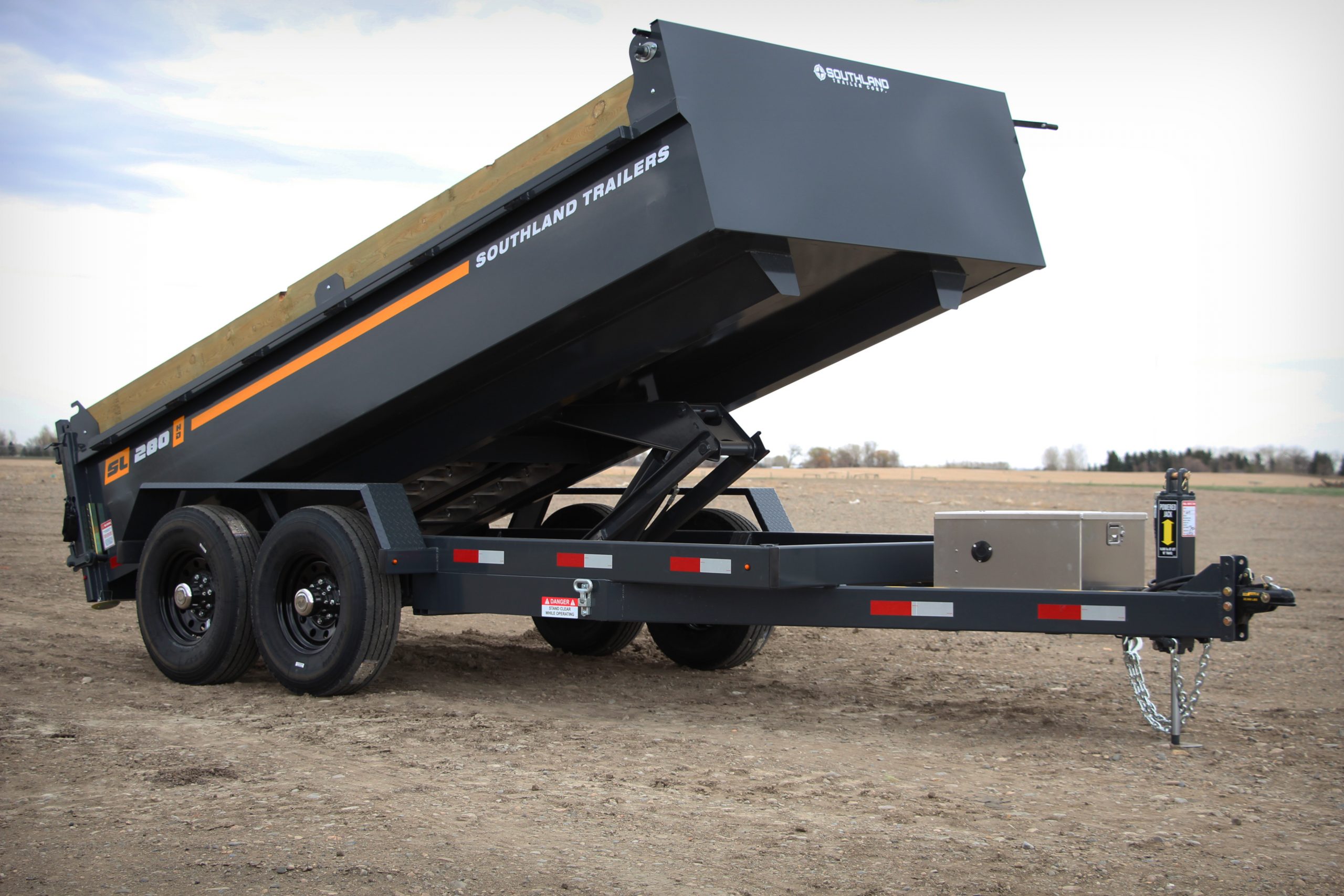 A dump trailer sitting on the lot of an Albuquerque trailer sales dealer